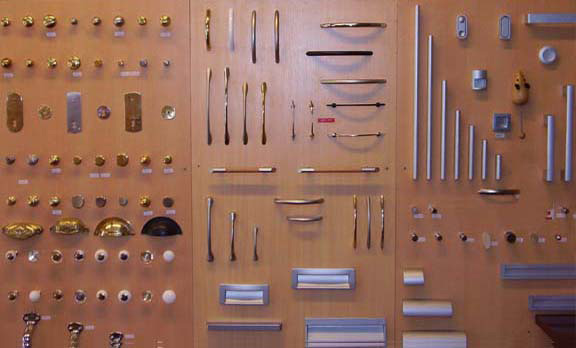 A display of various hardware items on a wall.